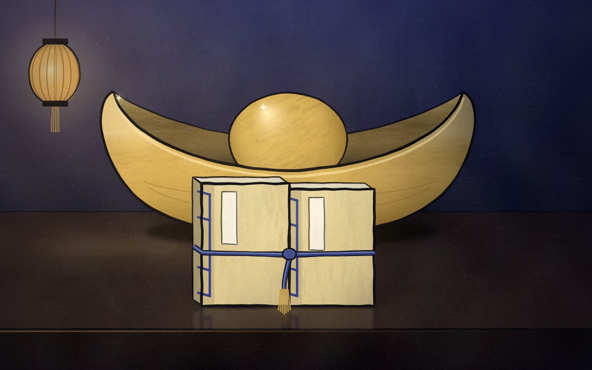 Two account books tied together with one cord, and behind them a large gold ingot standing on the counter.